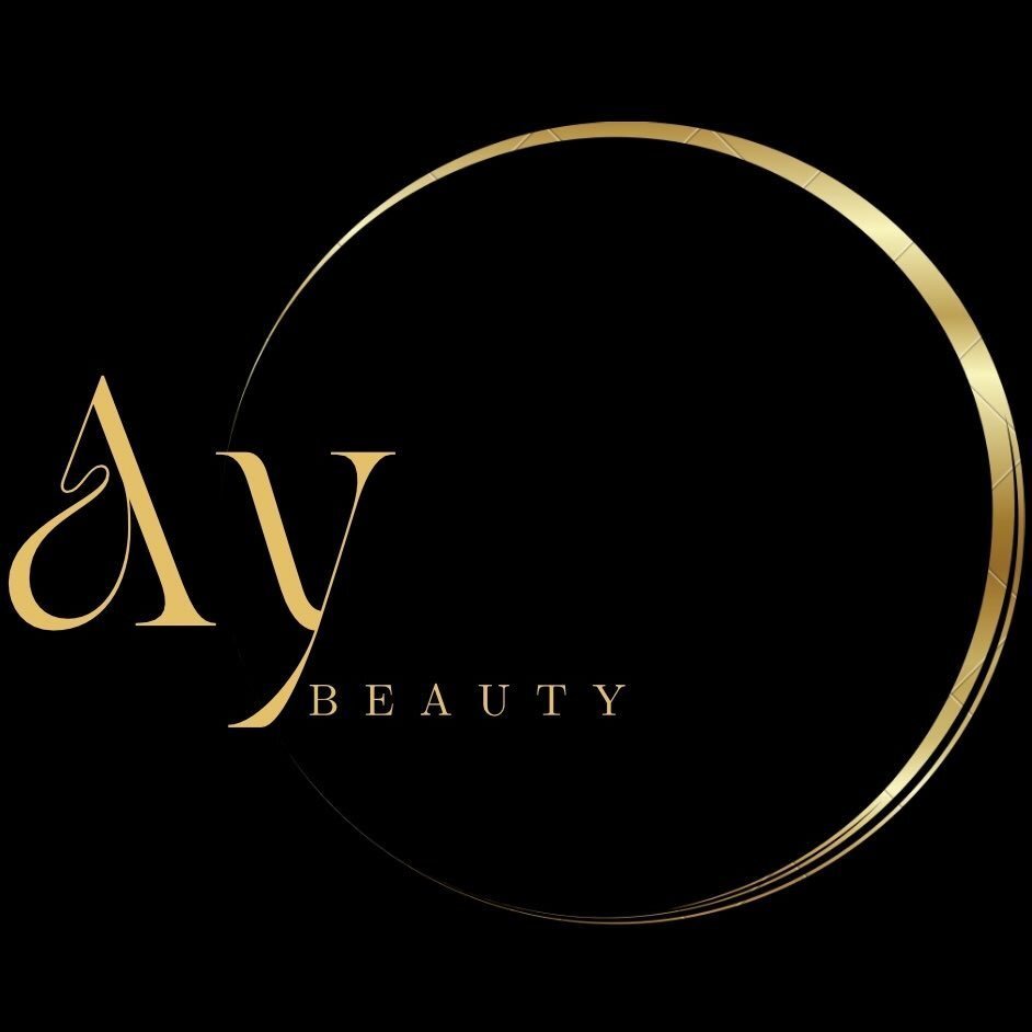 Outside of jina salon, a light pink lobby with chairs at the front desk, glass doors, and decor trees on both sides of entrance